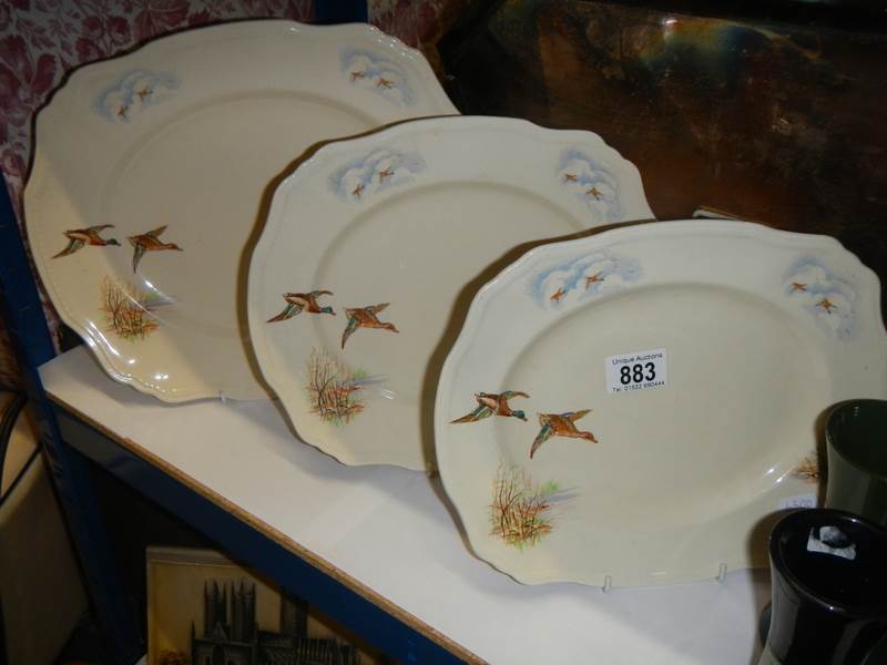 A set of three Alfred Meakin bird decorated meat platters.