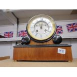 A Bracket clock with 5.5" dial, open excapement, mahogany case, bell striking, with key and pendulum