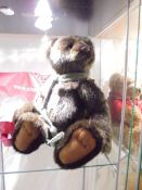 A Charlie Collector's bear with bag, 'Hugo'.