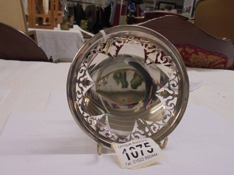 A silver bon bon dish with weighted base.