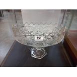 A heavy glass oval bowl/comport on footed base