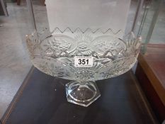 A heavy glass oval bowl/comport on footed base