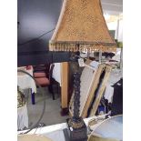 A tall good quality table lamp with beaded shade.