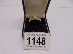 A 9ct gold ring size R. 3.3 grams.