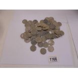 A large collection of collectable 50p coins including Benjamin Britain, Isaac Newton etc.,