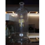 A large glass chemist bottle, 50cm high, base diameter 20cm