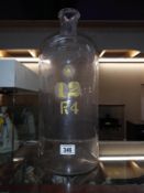 A large glass chemist bottle, 50cm high, base diameter 20cm