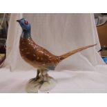 A Royal Dux hand painted pheasant, 10" high and 12" long, made in Czechoslovakia,