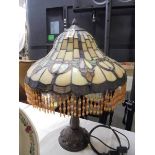 A good quality table lamp with Tiffany style beaded shade.