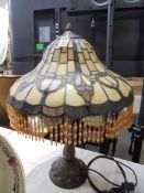 A good quality table lamp with Tiffany style beaded shade.