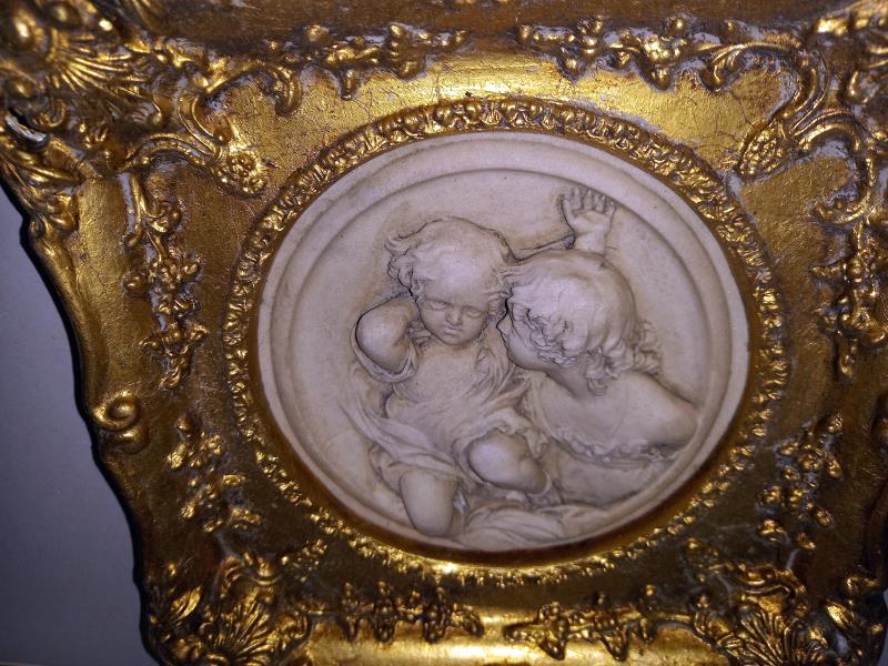 An ornate gilt framed plaque of children, diameter 17cm, frame 29cm x 29cm - Image 2 of 2