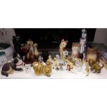 A quantity of cat ornaments