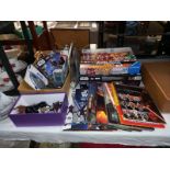 A collection of Star Wars items including figures, cards, books & games including Monopoly & model