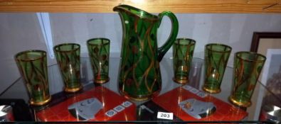 A vintage water set comprising of a jug & 6 glasses
