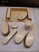 An eleven piece dressing table set.