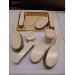 An eleven piece dressing table set.