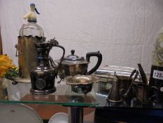 A mixed lot of silver plate including tureen, teapot etc.,