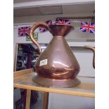 A antique copper one gallon jug.