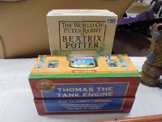 A boxed set of Beatrix Potter 'The World of Peter Rabbit' and a boxed set of Thomas The Tank Engine
