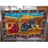 A large fabric wall hanging of a Spanish bull fight, approximately 150cm x 100cm