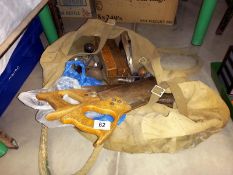 A carpenters tool bag and contents