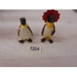 Two Beswick penguins.