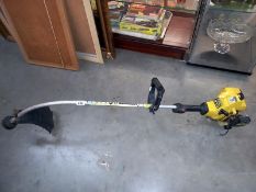 A McCulloch Trim Mac 210 petrol strimmer (Untested) (COLLECT ONLY)