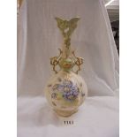 A very pretty, ornate, hand painted antique Austrian porcelain 12" high vase from the Roberte Hanke