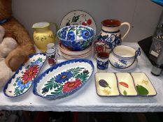 A selection of floral pottery table ware