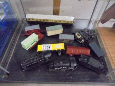 A quantity of unboxed '00' gauge rolling stock, coaches, locomotives etc.,