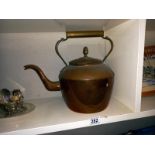 A large vintage copper kettle