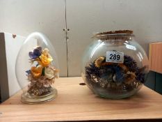 Two 3D dioramas in glass bowls