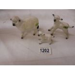 A Beswick sheep and two lambs.