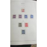 Two albums of mint Jersey definitive stamps including 1943, 1948 sheets etc.,