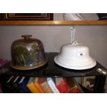 An art pottery cheese dome and 1 other