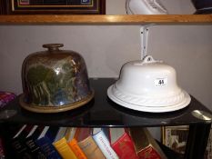 An art pottery cheese dome and 1 other