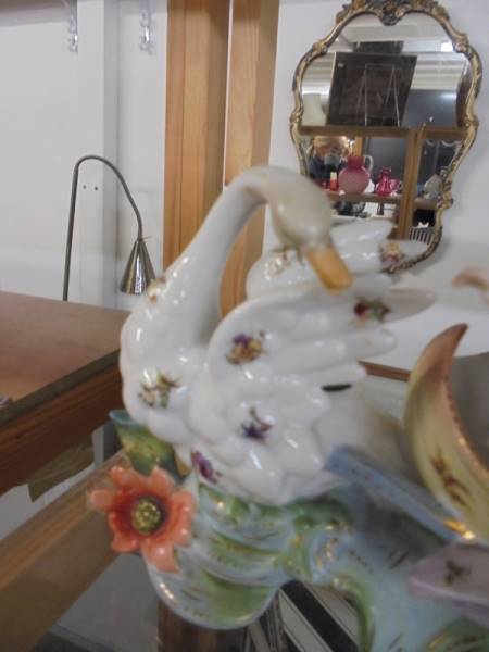 A porcelain carriage with swan and lady figure, (damage to thumb on right hand). - Image 3 of 3