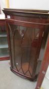 A dark wood stained mahogany astragal glazed corner cupboard. COLLECT ONLY.