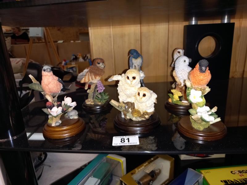 A quantity of Country Artists bird ornaments
