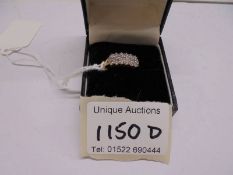 A 18ct gold ring set CZ, size P half, 3.5 grams.