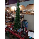 A green collapsible Christmas trees plus quantity of decorations and boxes of lights