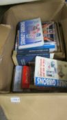A box of stamp price guides and sheets including UK, Channel Islands etc.,