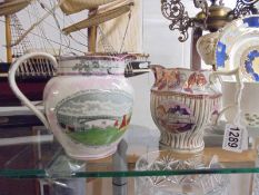 Two Victorian lustre jugs,