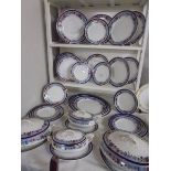 Approximately 40 pieces of Newport pottery dinnerware, COLLECT ONLY.