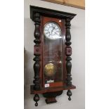 A Victorian mahogany Vienna wall clock, in working order, COLLECT ONLY.