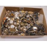 A large quantity of watch parts.