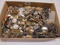A large quantity of watch parts.