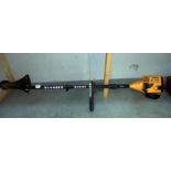 A JCB petrol strimmer, pull cord is free