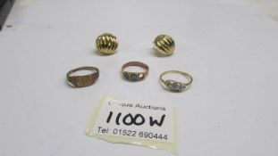 Three gold ring, 5.5 grams (one missing a stone) and a pair of yellow metal earrings, 5.3 grams.