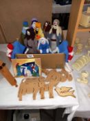 A quantity of knitted Nativity figures & wooden animal cut-outs